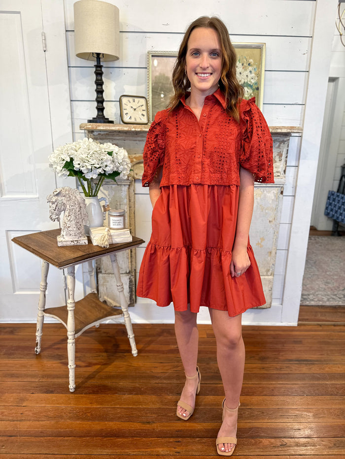 rust color dress with upper lace details and buttons 