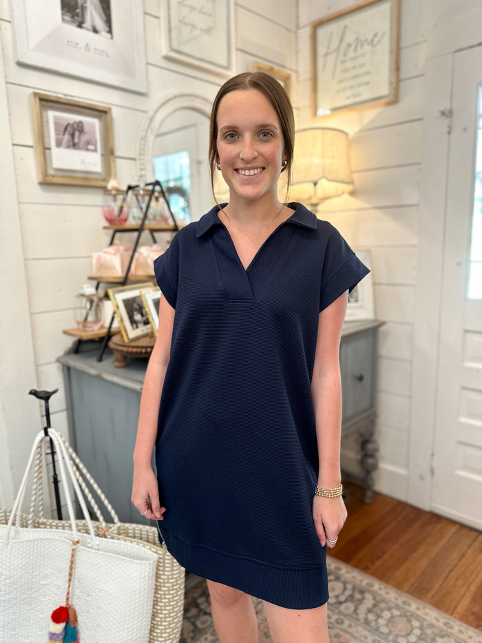 navy blue ribbed style dress with pockets