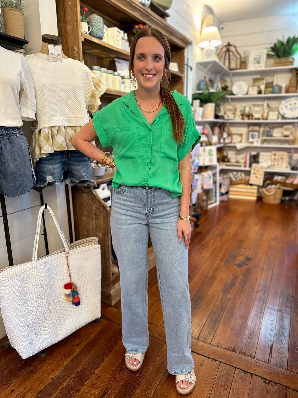 bright green button down top with rolled sleeves