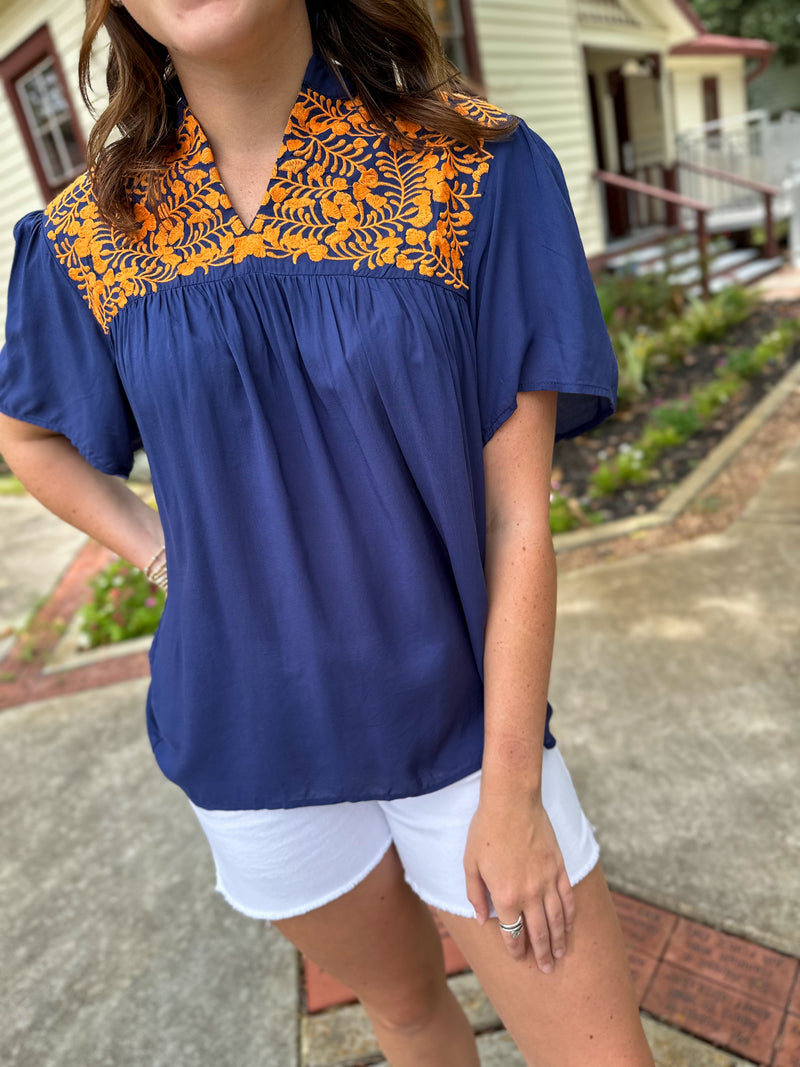 orange and navy blue embroidered top janie top layerz clothing 