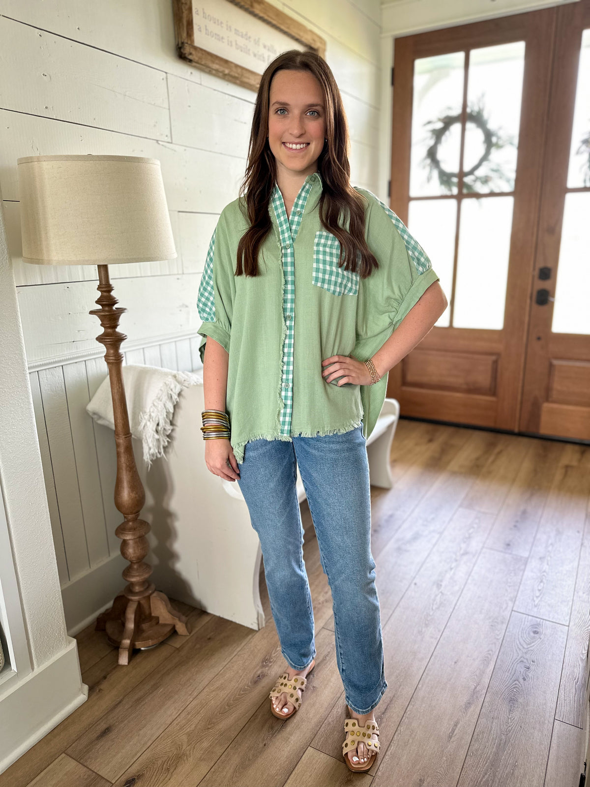 green button down top with checkered accents