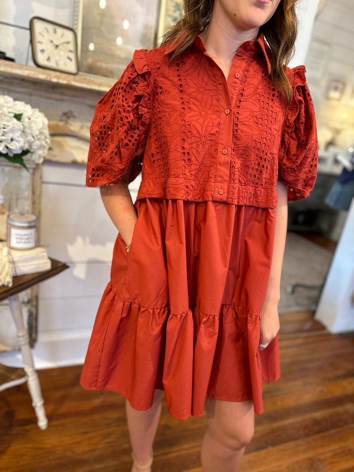 rust color dress with lace details upper and buttons