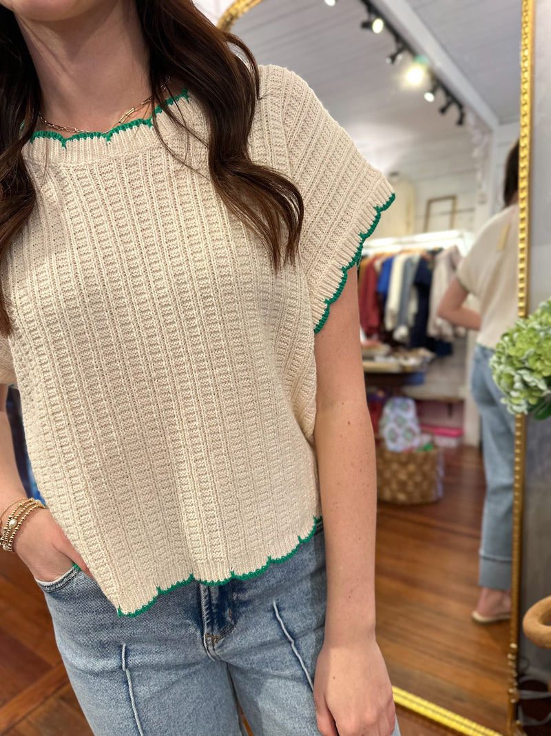 cream and green sweater top entro 2