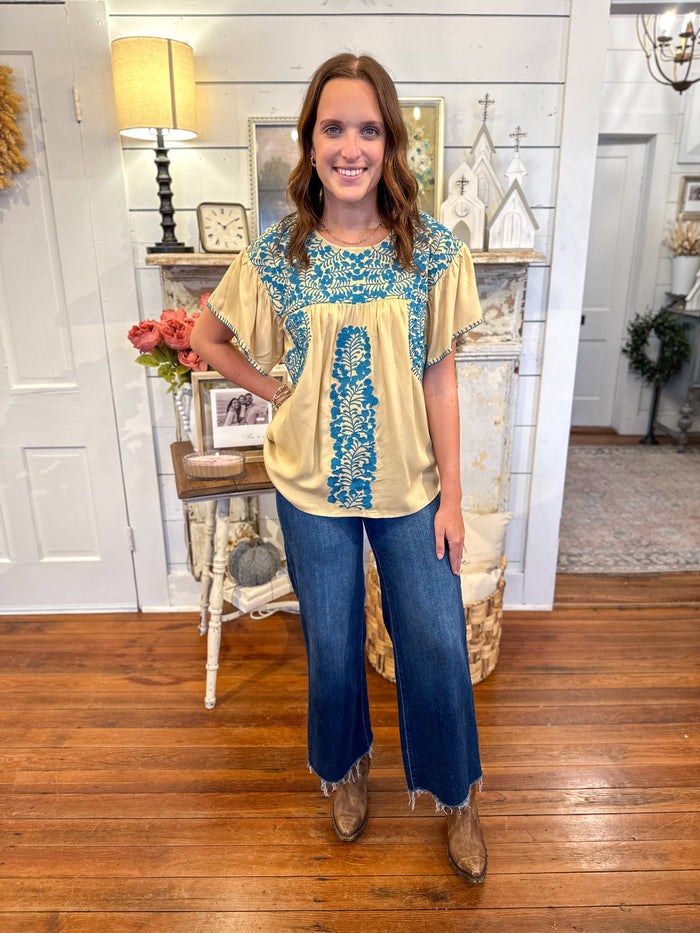 layerz clothing zoey top tan and blue embroidery 