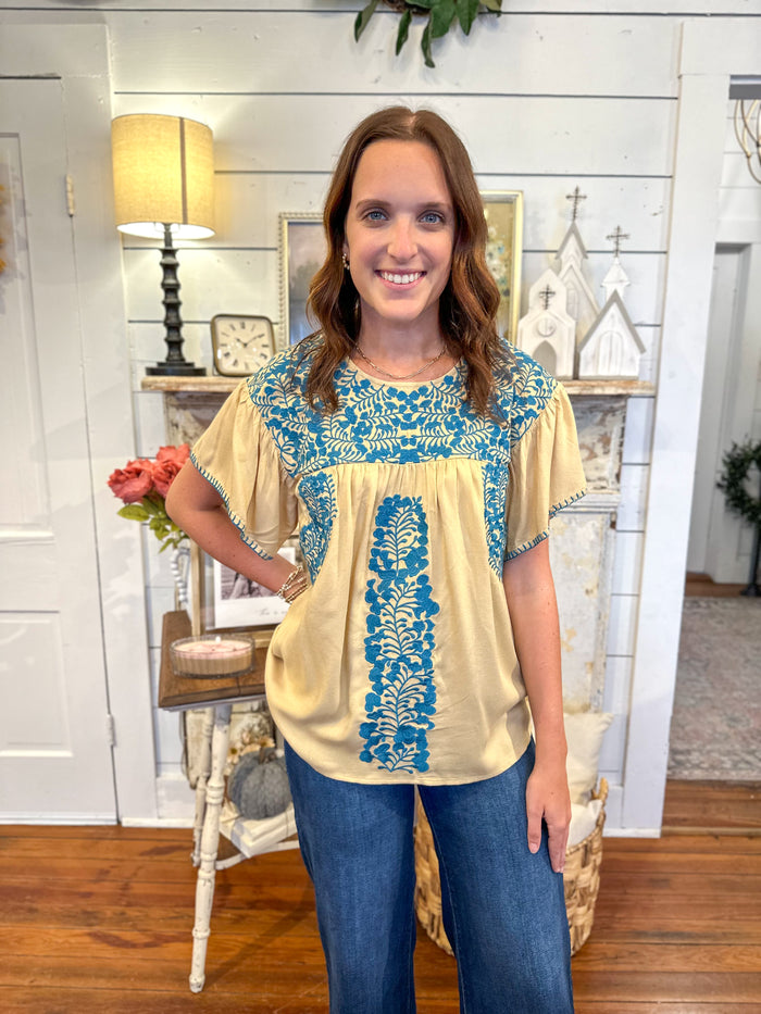 layerz clothing zoey top tan and blue embroidery 