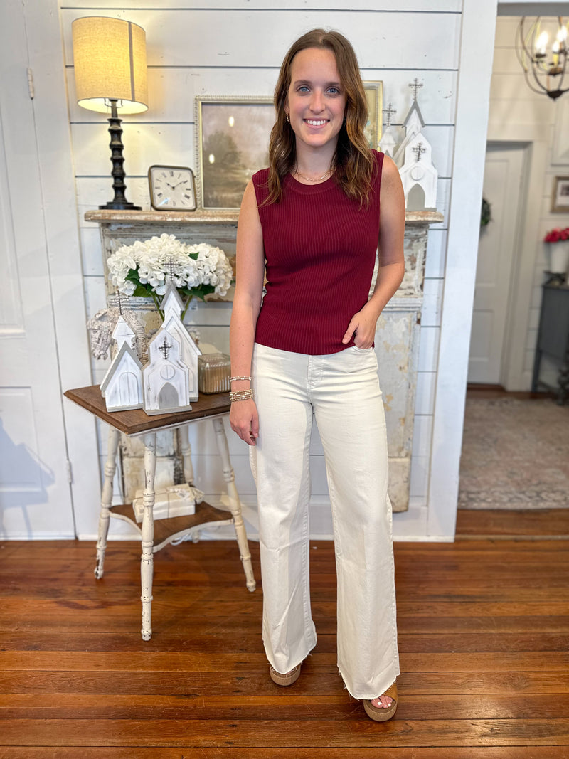 maroon ribbed tank top paired with wheat color dear john jeans