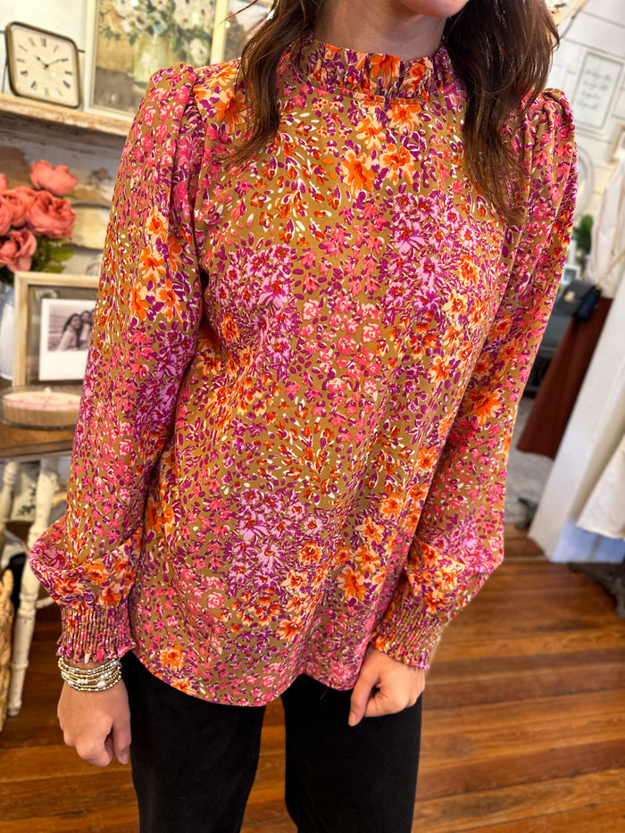 multi color floral long sleeve pink floral top. dressy casual 
elastic around wrist 