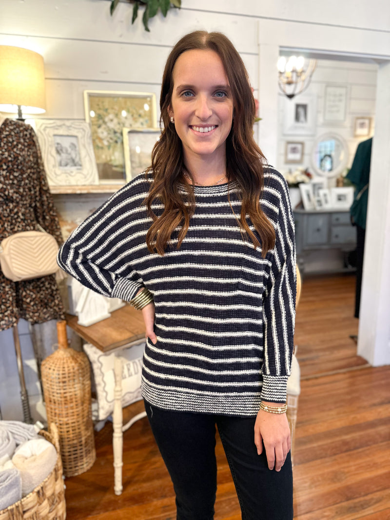 navy blue and white sweater top